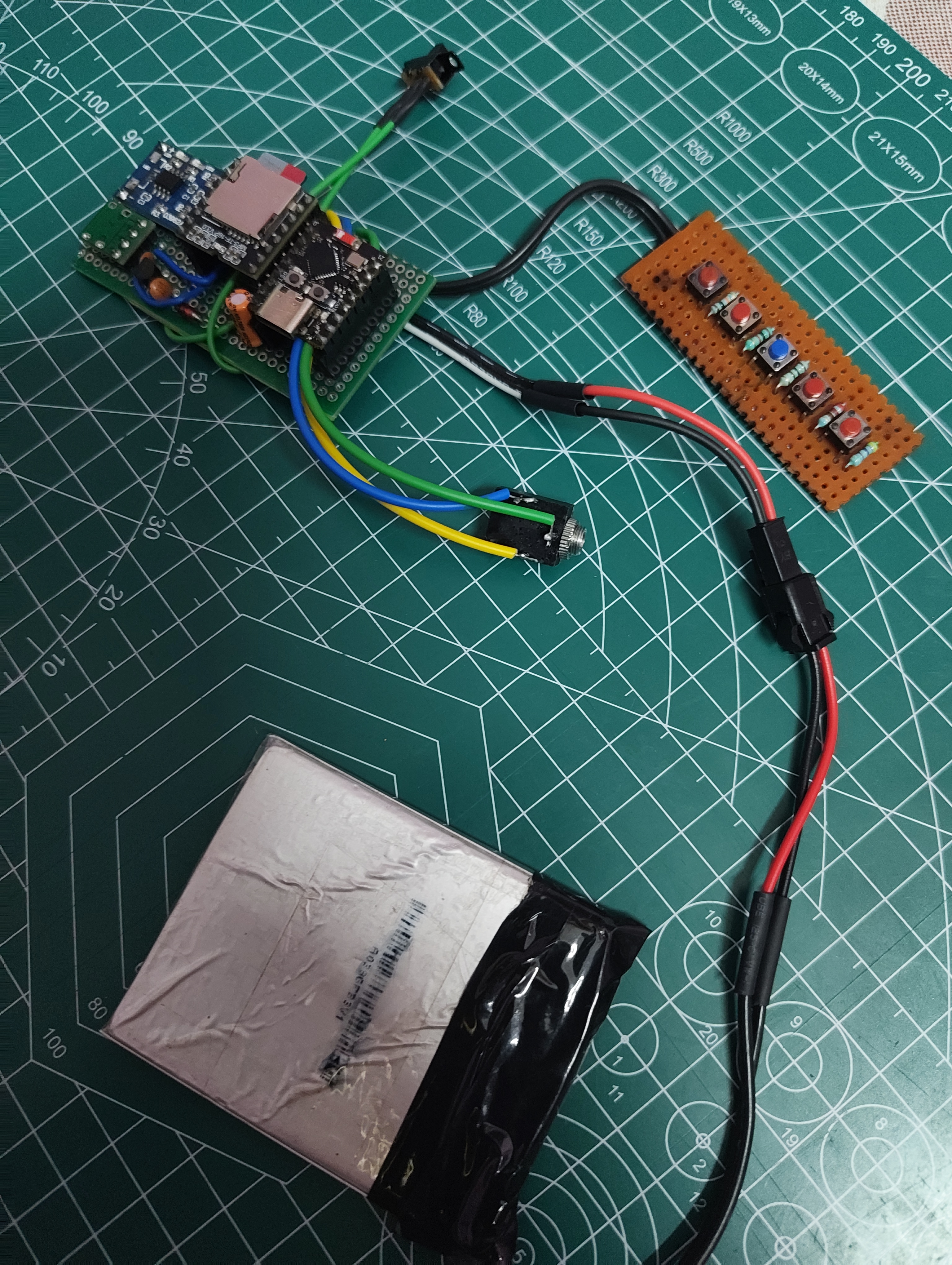 OpenDAP-C3 prototype hardware setup showing ESP32-C3, DFPlayer Mini, battery and wiring